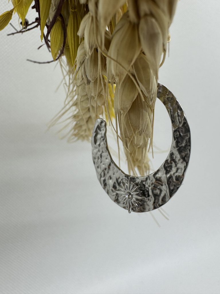 Boucles d'oreilles Agnès acier inoxydable argenté avec soleil strassé