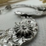 Boucles d'oreilles Agnès acier inoxydable argenté avec soleil strassé