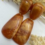 Boucles d'oreilles fantaisie à clips oranges et dorées - pour oreilles non percées